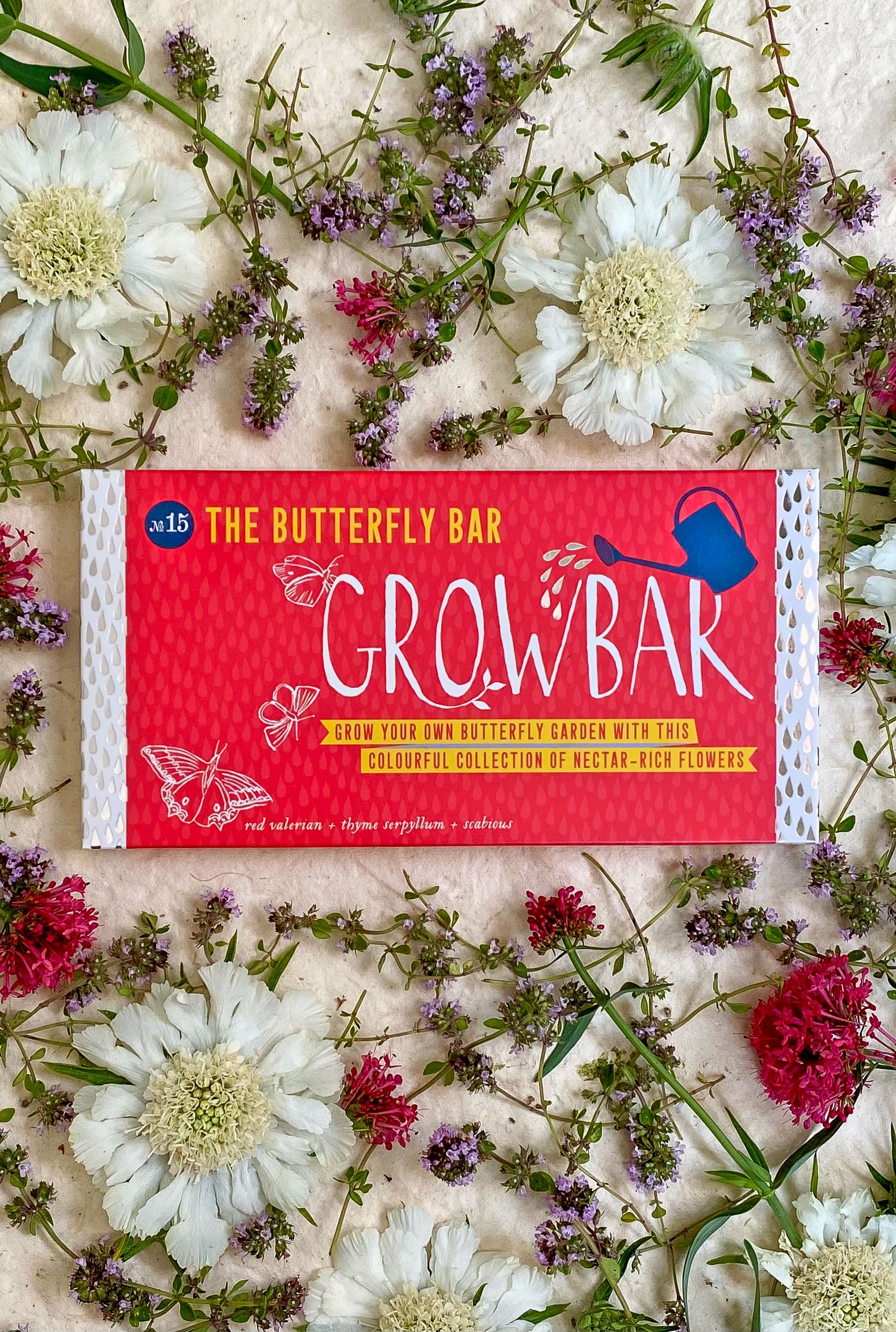 The Butterfly Growbar shown with different plants and flowers that grow in the bar.