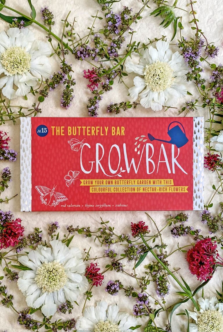 The Butterfly Growbar shown with different plants and flowers that grow in the bar.