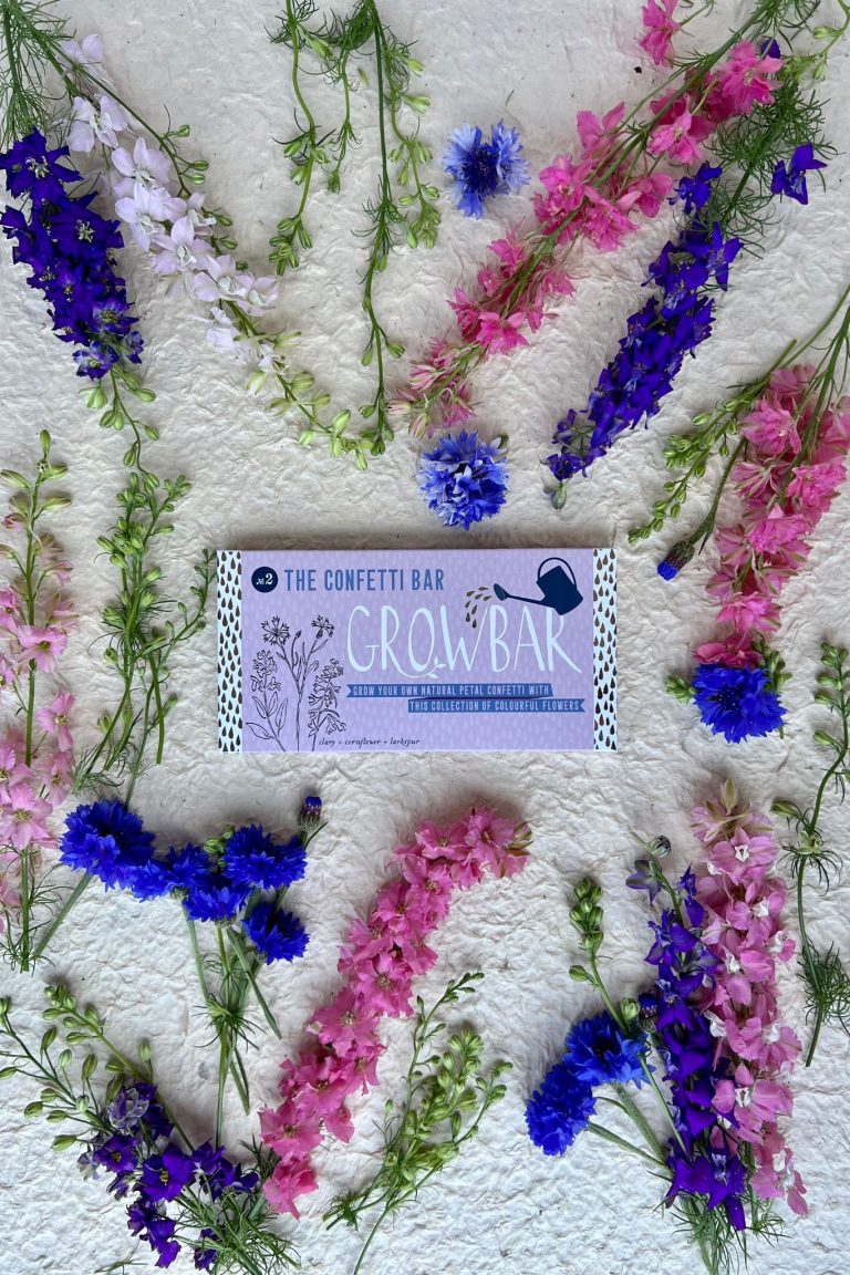 The Confetti Bar being shown with the different vibrant flowers from the bar.