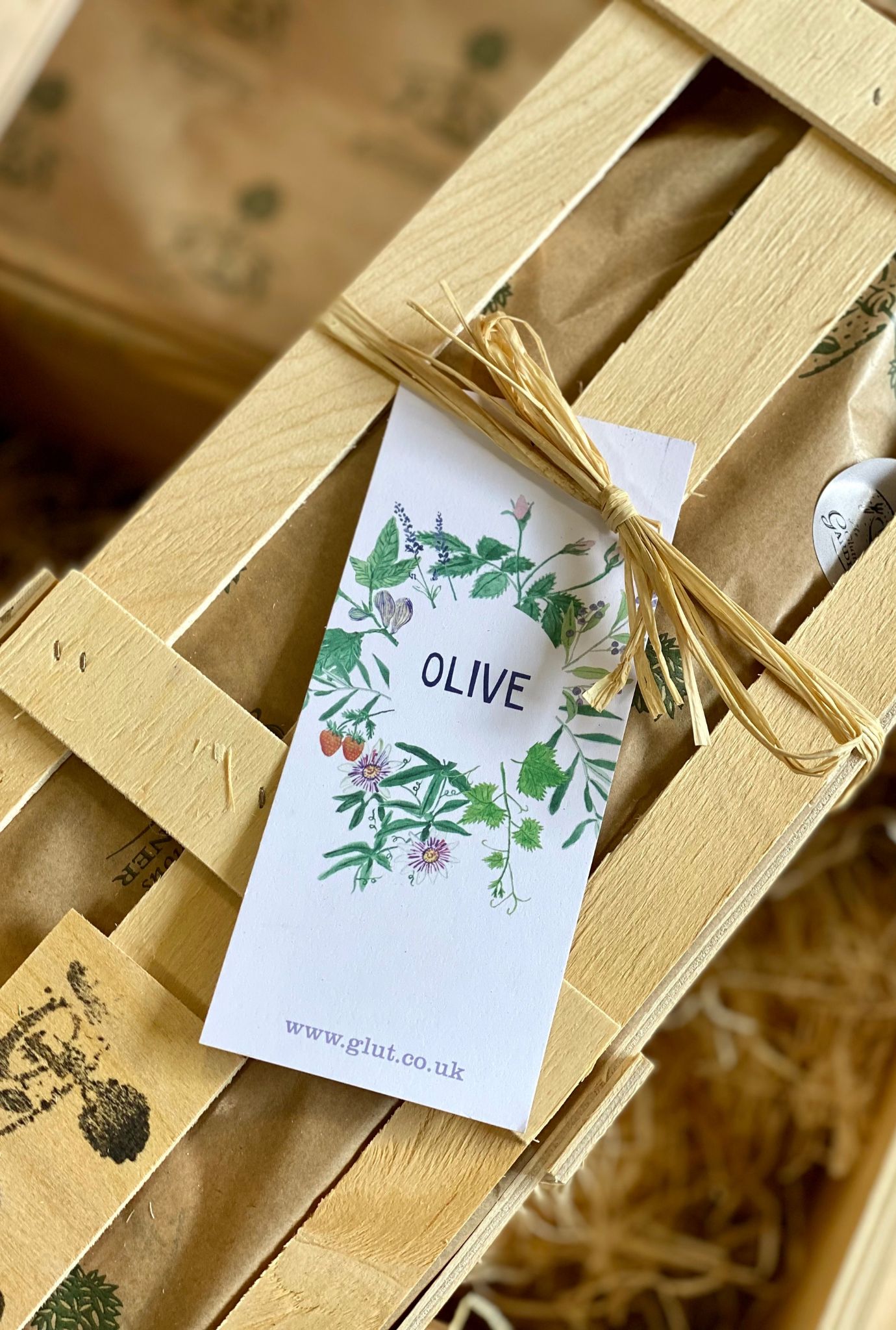 Wooden Olive Crate with twine and gift tag.