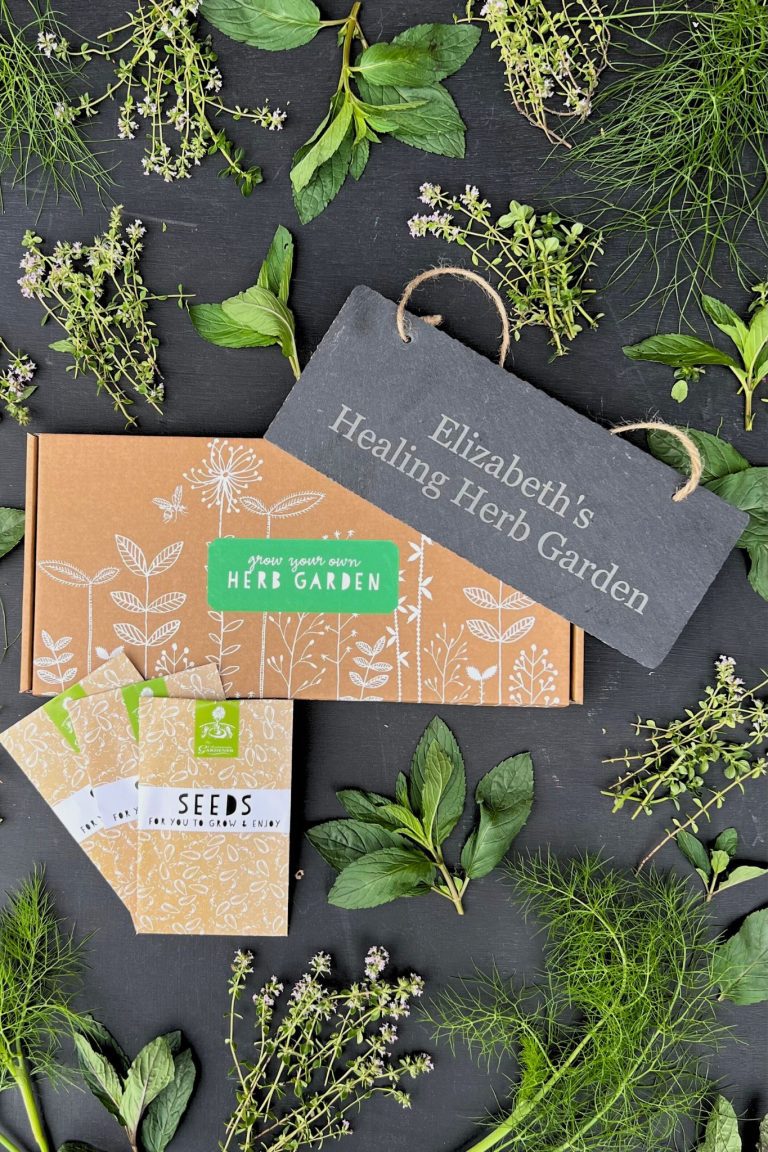 Herb Garden seed box with personalised slate and seed packets against black background.