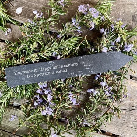 Personalised slate on Rosemary plant