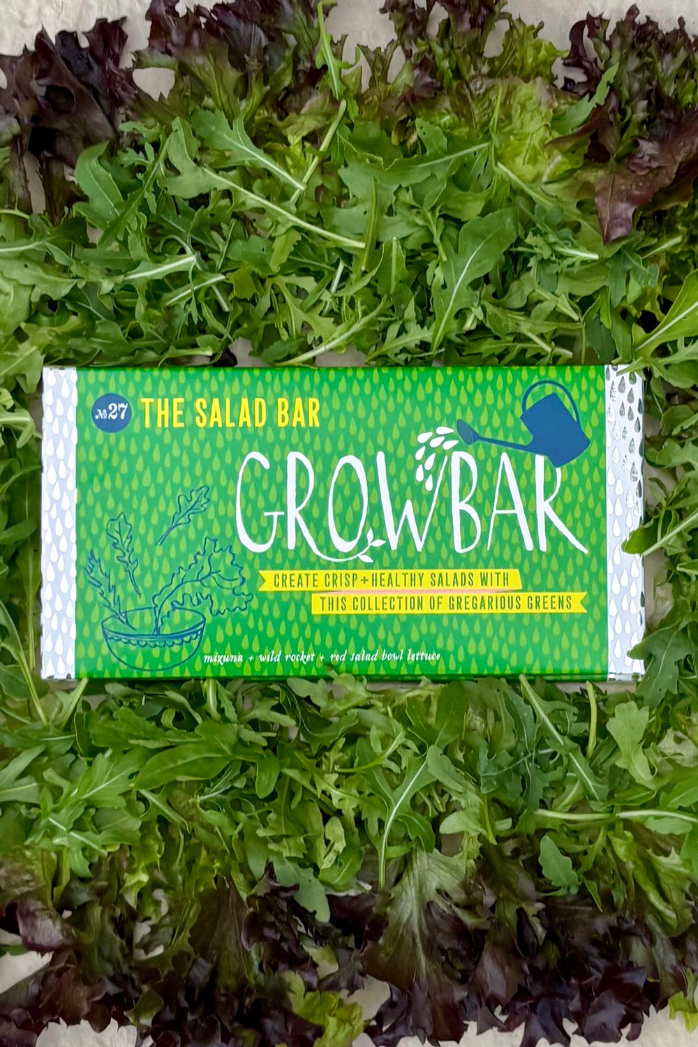 Grow a salad garden with the Salad Growbar. Seen here on a bed of crisp and delicious red salad bowl lettuce.
